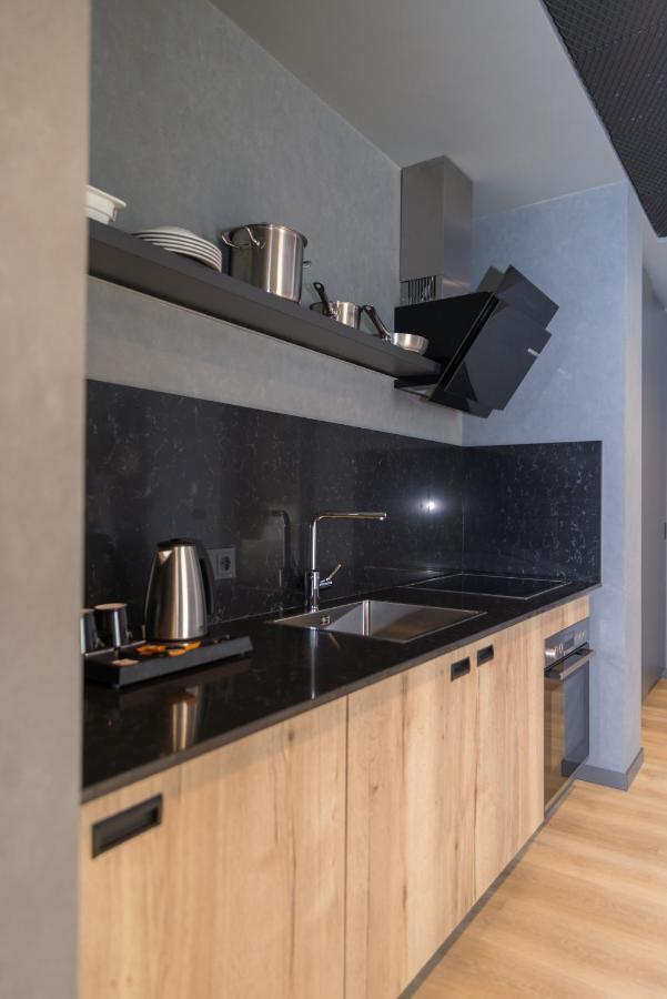 Mk Hotel Tirana Rinas Kültér fotó A kitchen in a serviced apartment in Paris