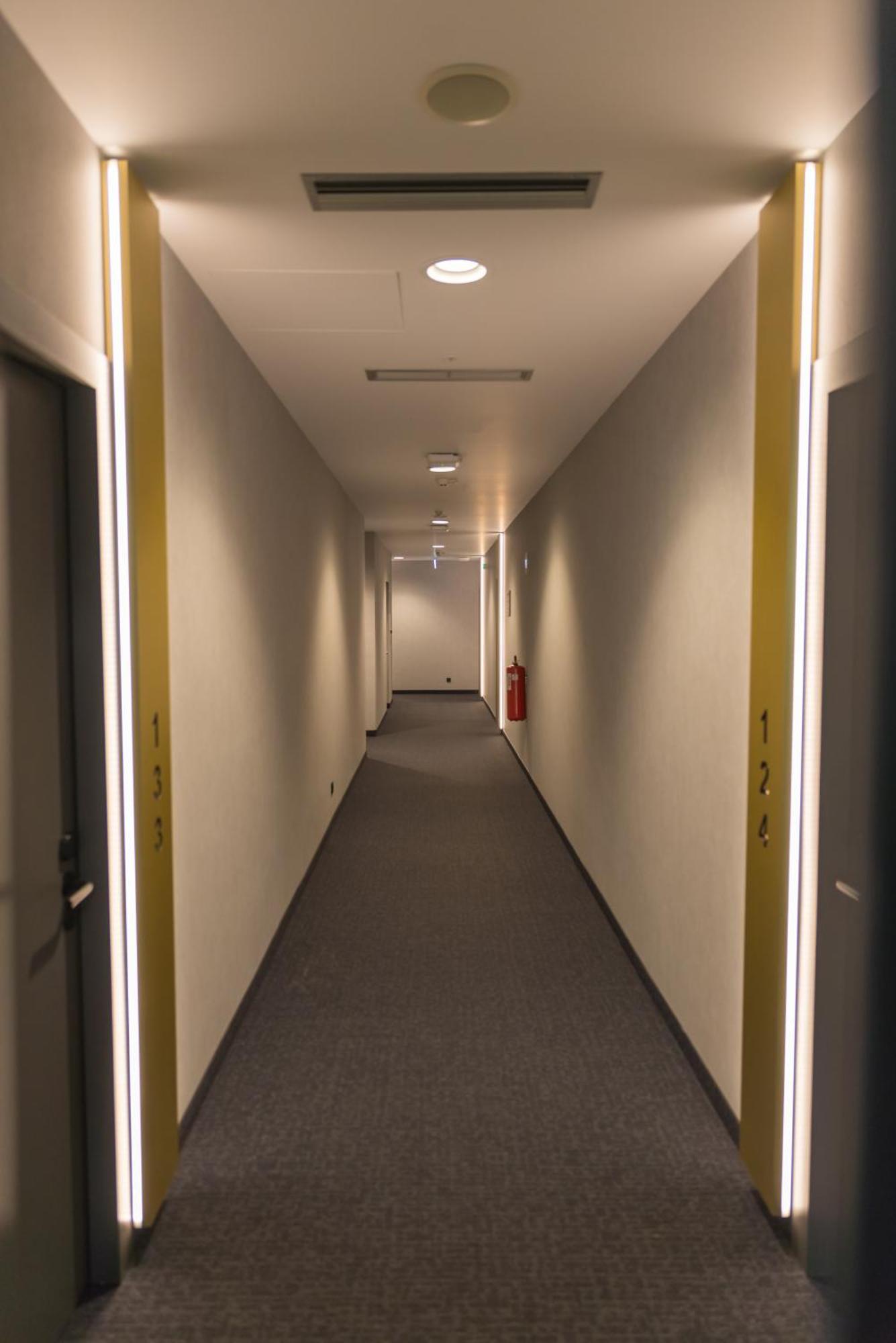 Mk Hotel Tirana Rinas Kültér fotó A corridor in the new building